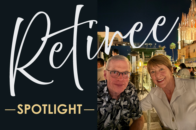 "Retiree Spotlight" over a smiling couple sitting at dinner on vacation.